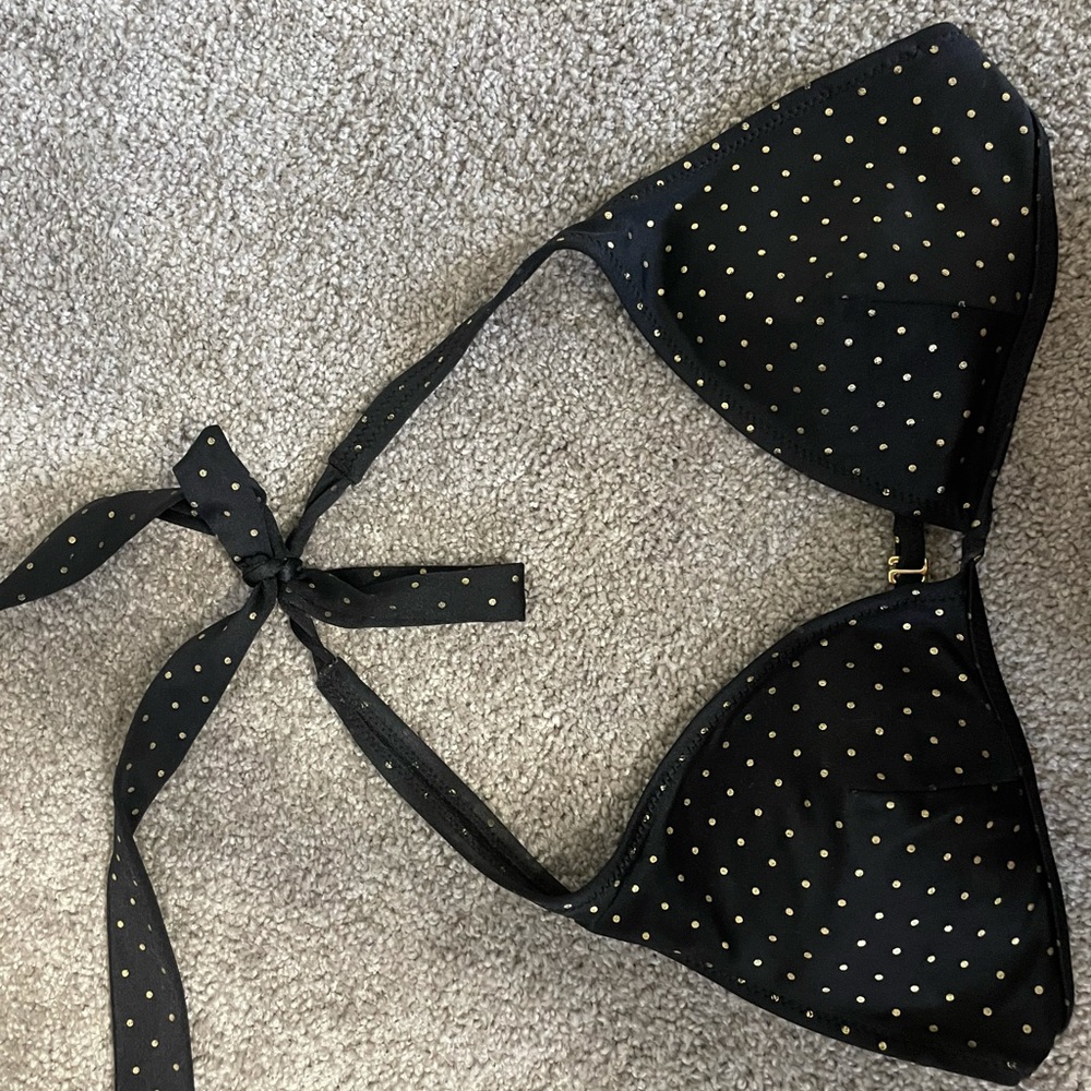 Simple black bikini top with gold polka dots